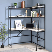 Right angled modern light oak and black corner desk and hutch with USB ports in a home office with accessories