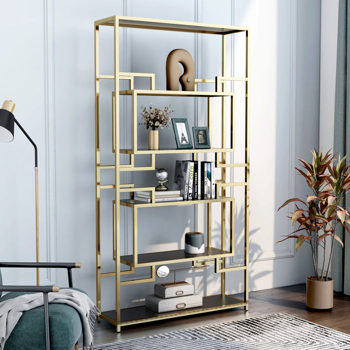 Right-angled modern glam geometric etagere bookcase in gold with five shelves in a contemporary living area with accessories