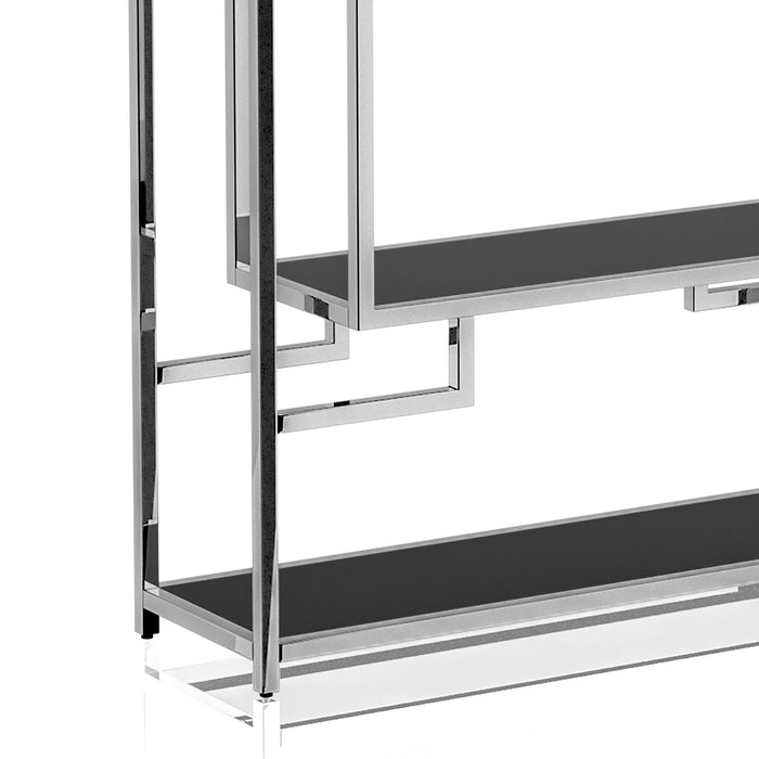 Right-angled close up modern glam geometric etagere bookcase in chrome lower left shelf and geometric detail on a white background