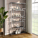 Right-angled modern glam geometric etagere bookcase in chrome with five shelves in a contemporary living area with accessories