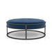 Front-facing contemporary navy and black round ottoman on a white background