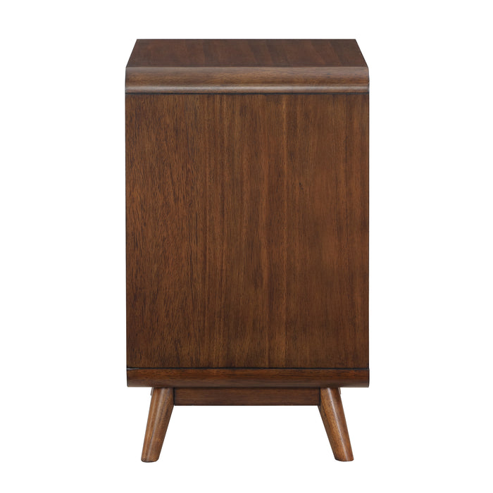 Side-facing mid-century modern dark oak side table with rounded edges and flared tapered feet on a white background.