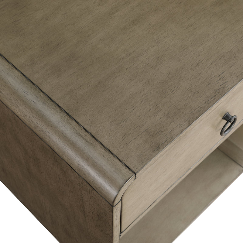 Right angled close up top corner detail of a mid-century modern one-drawer gray wood side table on a white background