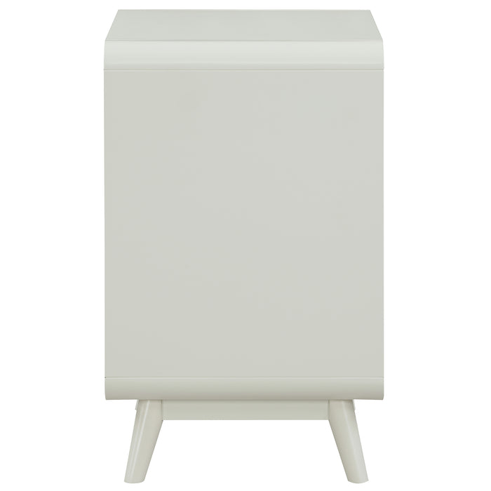 Front facing side view of a mid-century modern one-drawer white side table on a white background