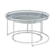 Left angled glam chrome and gray glass two-piece nesting tables, shown nested, on a white background