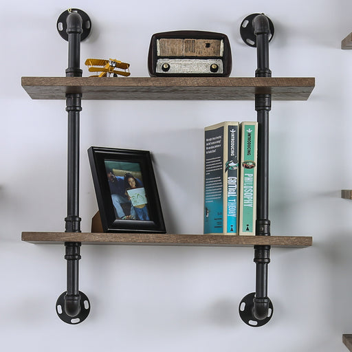Front-facing industrial natural and sand black wall shelf on a wall with accessories