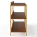 Front facing side view contemporary three-shelf light walnut and gold bookcase on a white background