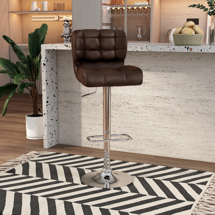 Right-angled brown leatherette bar chair against with accessories. The biscuit tufted swivel seat is a modern look against the chrome pedestal base with footrest.