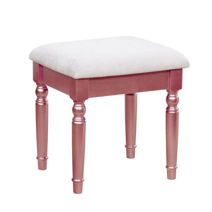 Right-angled rose gold vanity stool against a white background. Turned legs prop up a fabric-top seat.