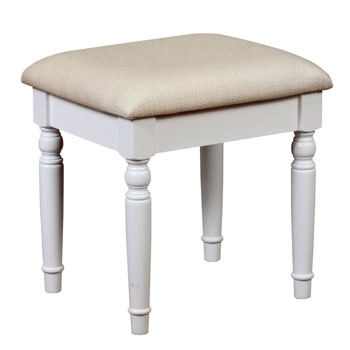 Right-angled white vanity stool against a white background. Turned legs prop up a fabric-top seat.
