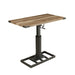Angled right-facing view of industrial black and rustic oak steel and veneer adjustable desk on white background