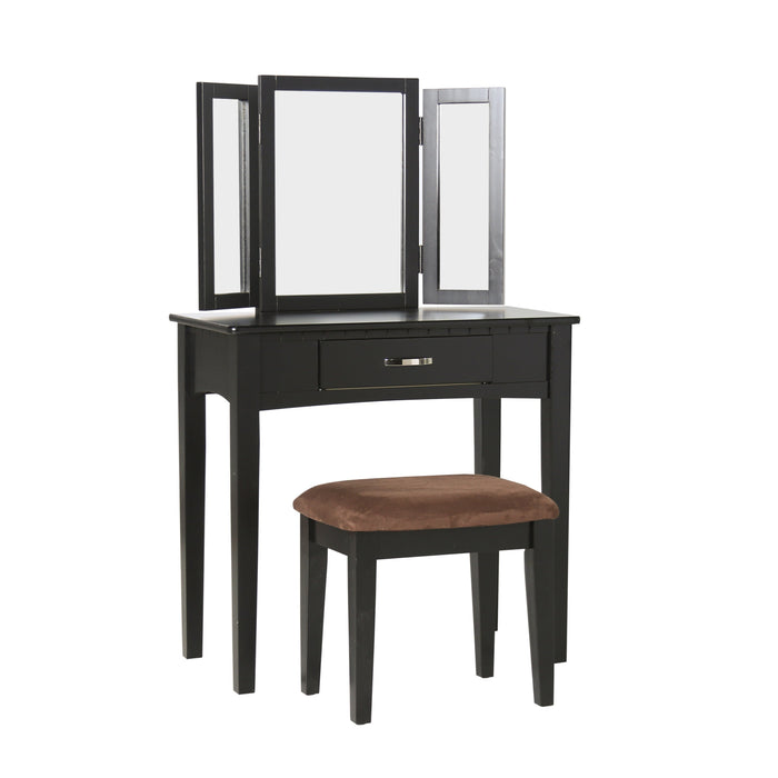 Right-angled black vanity set against a white background. A tri-fold mirror, drawer with silver bar pull, and microfiber upholstered seat sit on tapered legs.