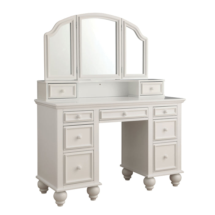 Right-angled white vanity table against a white background. This vanity table offers a tri-fold mirror and a total of nine drawers.