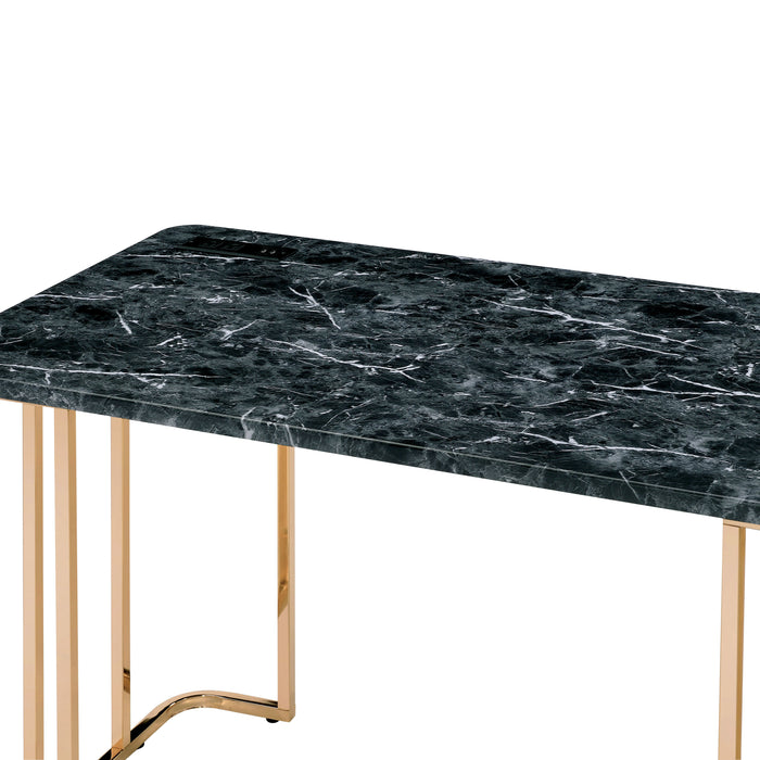 Cropped, angled right-facing view of contemporary gold steel and black marble top writing desk on white background