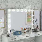 Angled view of glam luminous white glass and MDF rectangular mirror in living space with furnishings and accessories