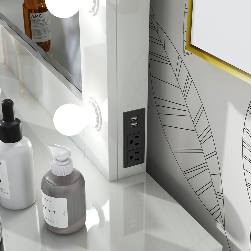 Angled, cropped view of corner and power outlet on glam luminous white glass and MDF rectangular mirror in living space with accessories