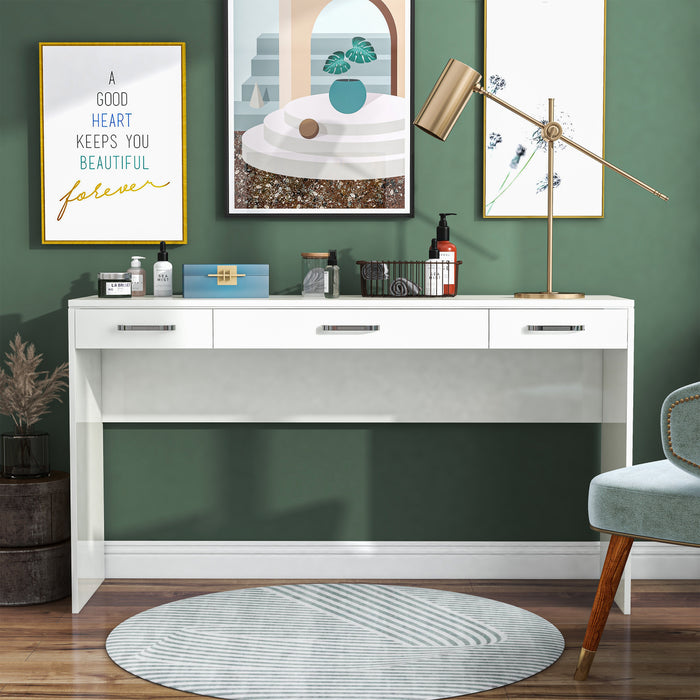 Front-facing view of glam luminous white pine wood three-drawer vanity table in living space with accessories
