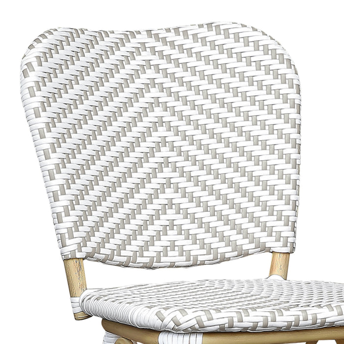 Detail shot of a grey and white chevron patterned wicker curved backrest.