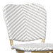 Detail shot of a grey and white chevron patterned wicker curved backrest.