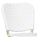 Detail shot of a white chevron patterned wicker curved backrest.