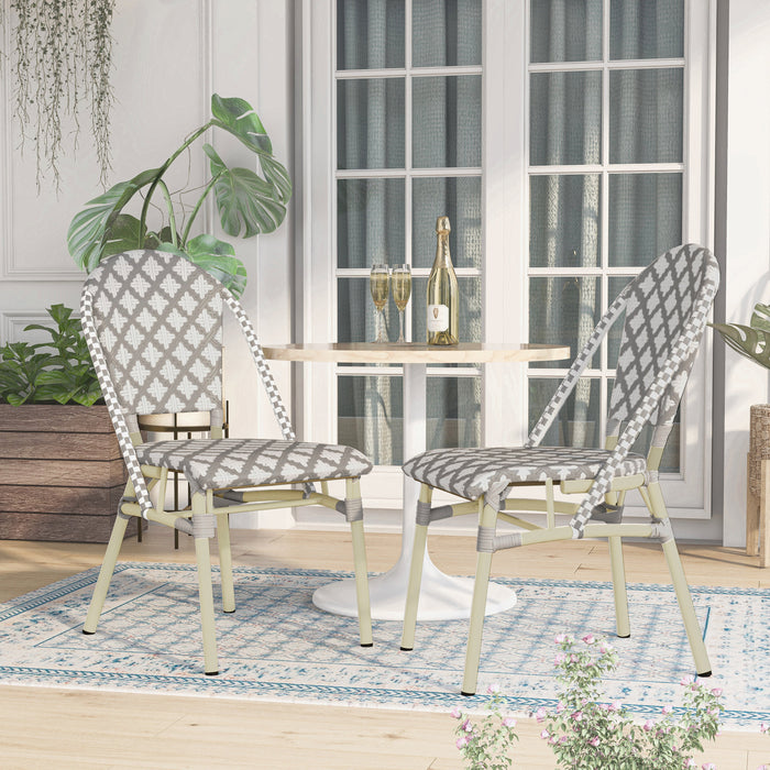 Grey and white octofoil patterned chairs in a contemporary patio.