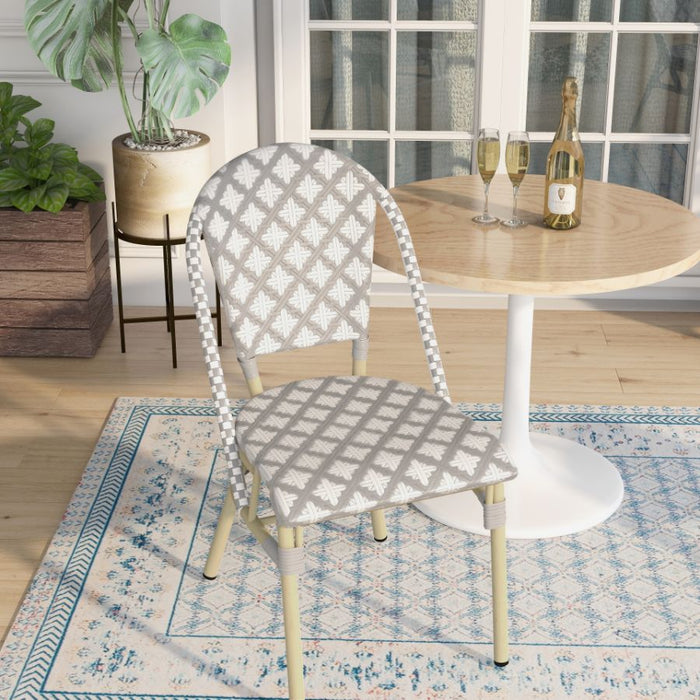 Grey and white octofoil patterned chairs in a contemporary patio.