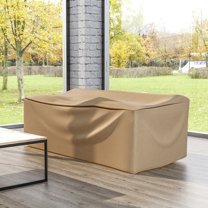 A large, tan, seat cover wrapping over an outdoor sofa in a patio.