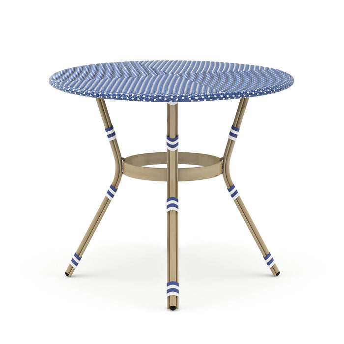 Front-facing French style blue and white wicker counter height patio dining table on a white background