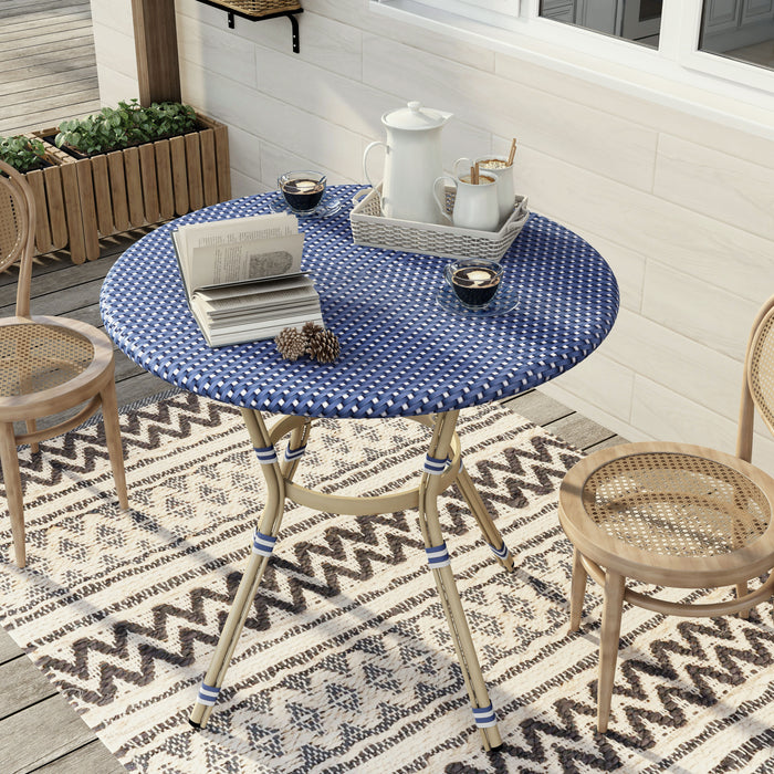 Front-facing top view French style blue and white wicker counter height patio dining table on a patio with accessories