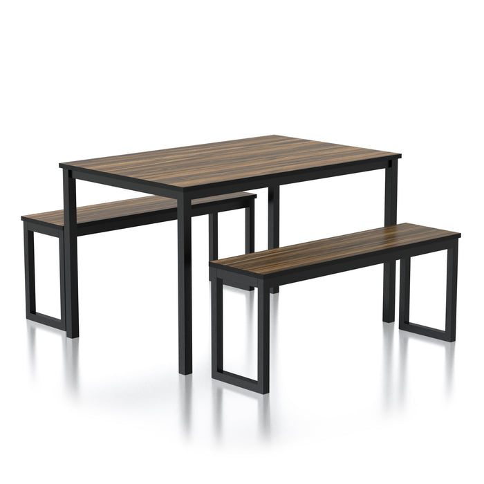 Right angled rustic walnut and black three-piece dining table and benches set on a white background