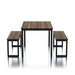 Front facing rustic walnut and black three-piece dining table and benches set on a white background
