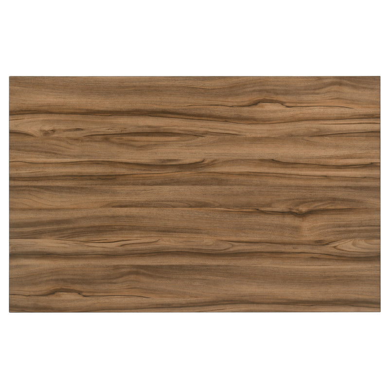 Top-facing walnut and black dining table on a white background