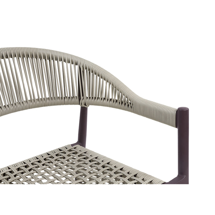 Right-angled close up bohemian faux wicker patio dining chair woven seat and back detail on a white background