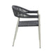 Front-facing side view bohemian faux wicker patio dining chair in light gray on a white background