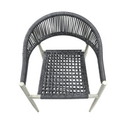 Front-facing top view bohemian faux wicker patio dining chair in light gray on a white background