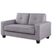 Left-angled contemporary gray upholstered loveseat with tufted back cushions and wide track arms on a white background