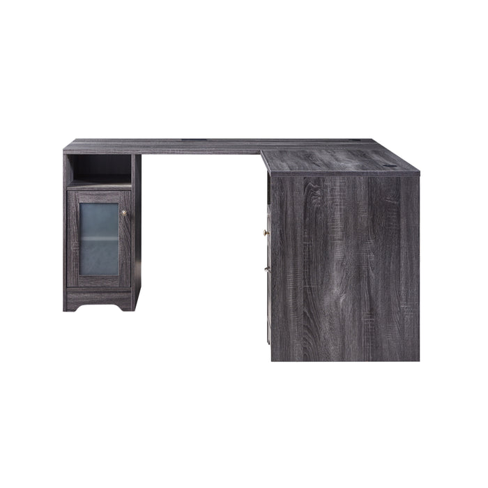 Right-side facing view of modern dark gray finish L-shaped desk with storage on white background