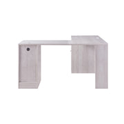 Back-right facing view of modern white oak finish L-shaped desk with cord management cutout on white background