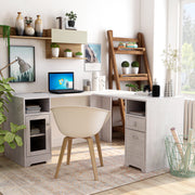 Slightly angled front-facing view of modern dark gray finish L-shaped desk with storage in living space with accessories