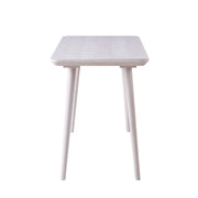 Side-facing view of contemporary white oak finish writing desk on white background