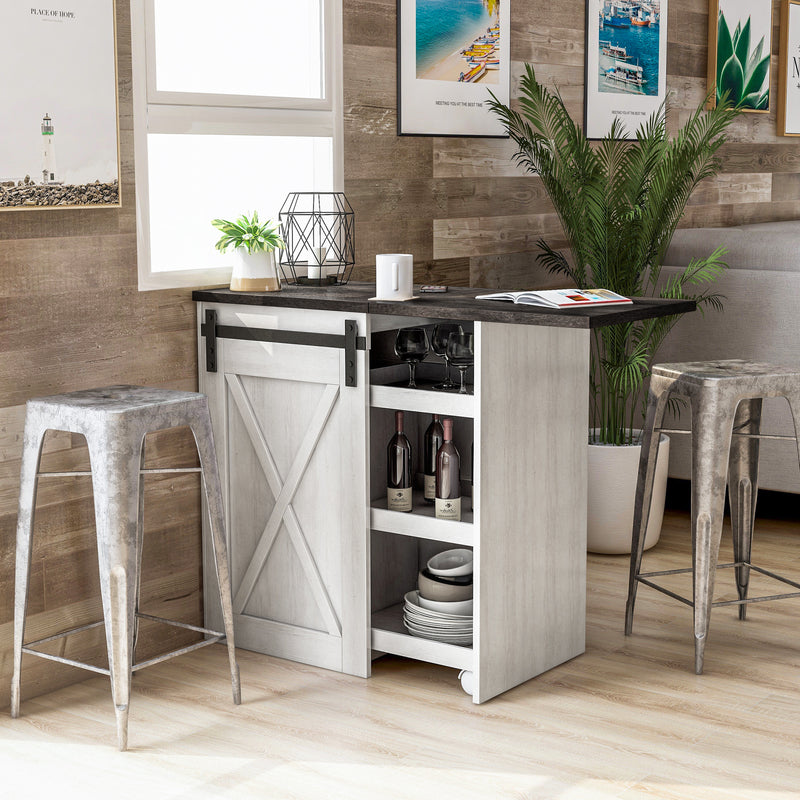 Angled view of farmhouse white oak and distressed gray finish MDF bar table with open door in living space with accessories