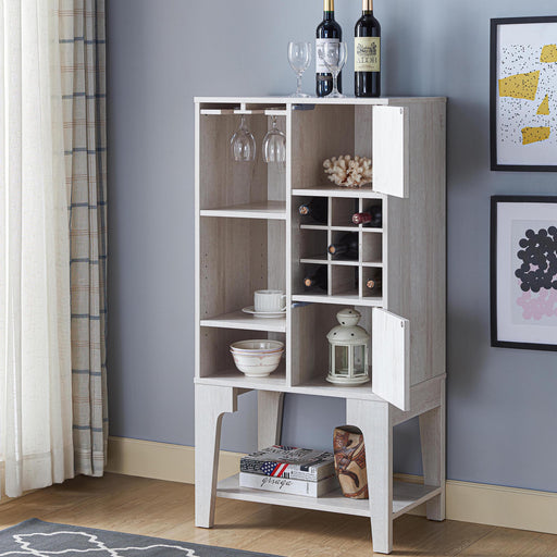 Left angled contemporary white oak multi-shelf wine cabinet with doors open in a living space with accessories