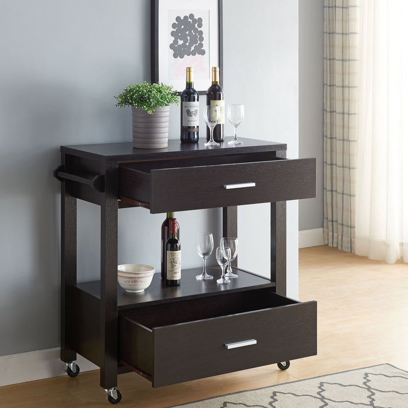 Angled left-facing view of transitional cappuccino finish kitchen cart with storage drawers open in living space with accessories