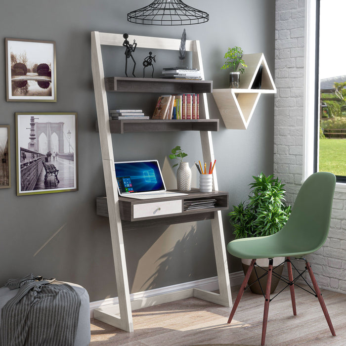 Right angled contemporary white oak two-shelf leaning desk in a home office with accessories