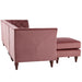 Right-angled back view glam rose pink upholstered sectional with left-facing chaise, flared arms, and button tufted back in white background