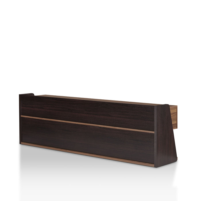 Left angled back view of a contemporary three-drawer light walnut and black TV stand on a white background