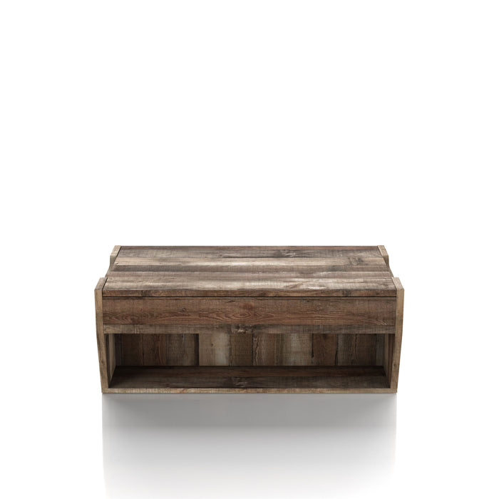 Left angled rustic reclaimed barnwood storage coffee table in a living room with accessories