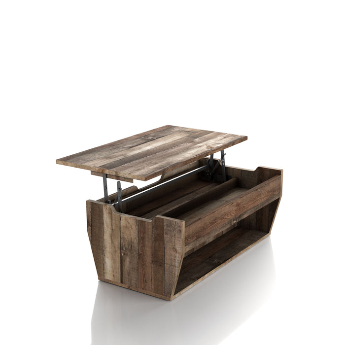 Slight left angled rustic reclaimed barnwood storage coffee table with top lifted in a living room with accessories