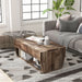 Front-facing rustic reclaimed barnwood storage coffee table with top lifted on a white background