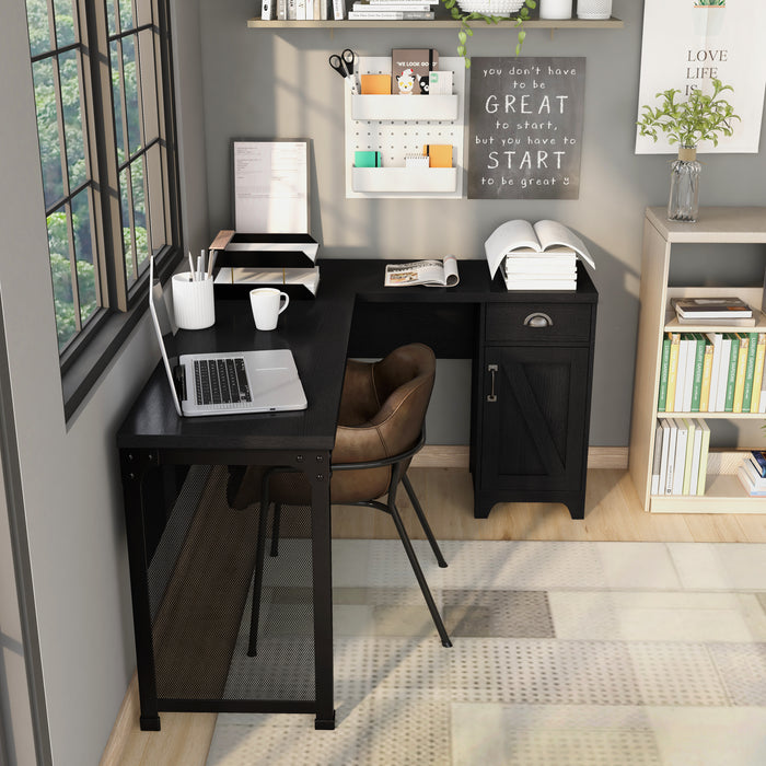 Top view of an L-shaped desk in the corner of a modern farmhouse-style home office. The black desk sits against grey walls. Above one side of the desk is a black-trimmed window and above the right side is a taupe shelf with books, plants, and decor. A wall stationary and an inspirational quote hang on the wall just below the shelf. This desk holds a laptop, file tray, and other office-related things. A brown leather chair sits at the desk with a low back and black flared legs.